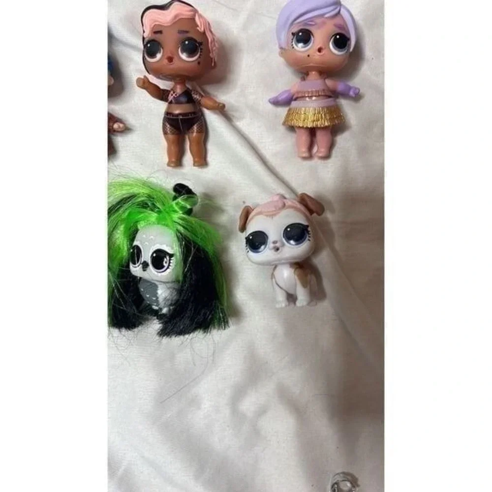 Set Of Nine LOL Surprise Dolls.